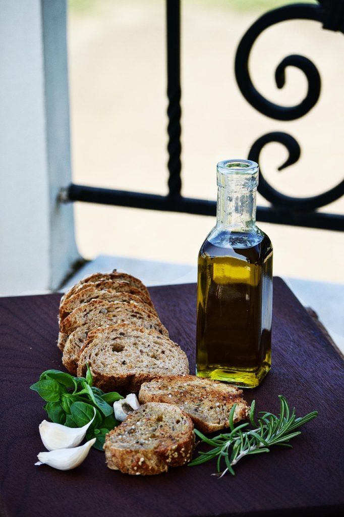 food, olive oil, garlic, table, board, outdoor, mediterranean, rosemary, bread, black bread, seeds bread, fresh, vegan, vegetarian, extra virgin, virgin, green, greece, greek, outdoor food, food outside, olive oil, olive oil, olive oil, olive oil, olive oil